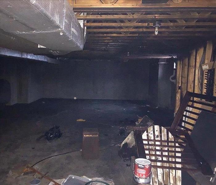 A clean, painted basement after a fire damage clean up