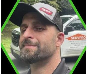 Male SERVPRO employee with a black shirt.