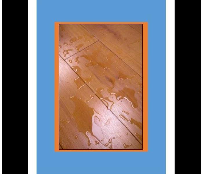 picture of water on a wooden floor with orange and blue background
